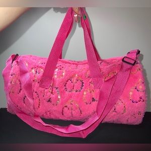 Furry hot pink duffle bag